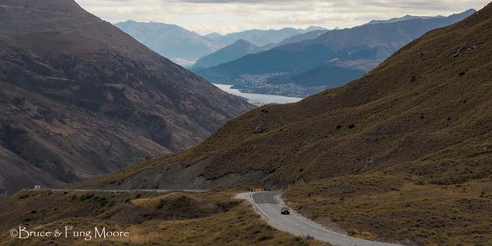 The Crown Range Road dropping towards Queenstown in the distance.