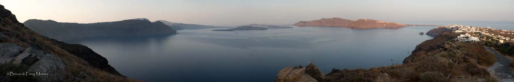 Oia and Santorini caldera at sunrise