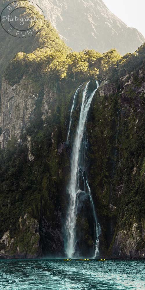 Stirling Falls with kayakers in Milford Sound